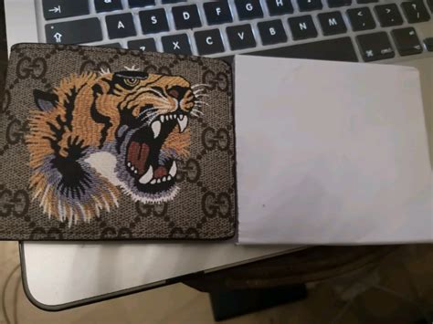 gucci wallet lion for sale.